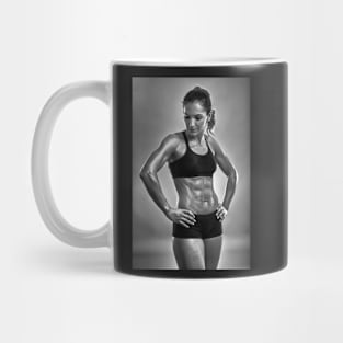 Fitness woman posing in studio Mug